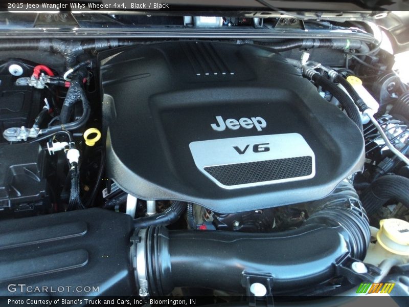 Black / Black 2015 Jeep Wrangler Willys Wheeler 4x4