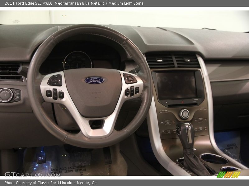 Mediterranean Blue Metallic / Medium Light Stone 2011 Ford Edge SEL AWD
