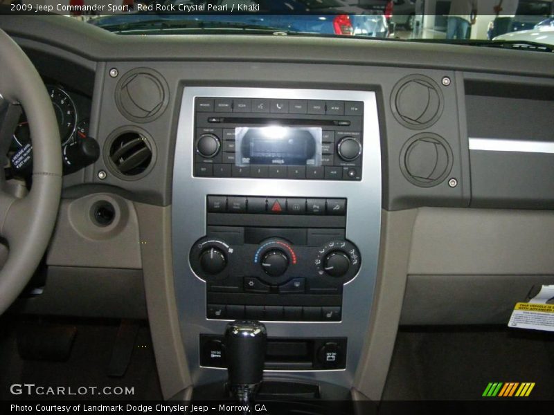 Red Rock Crystal Pearl / Khaki 2009 Jeep Commander Sport