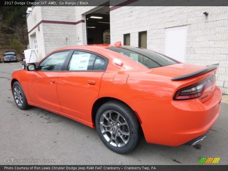 Go Mango / Black 2017 Dodge Charger SXT AWD