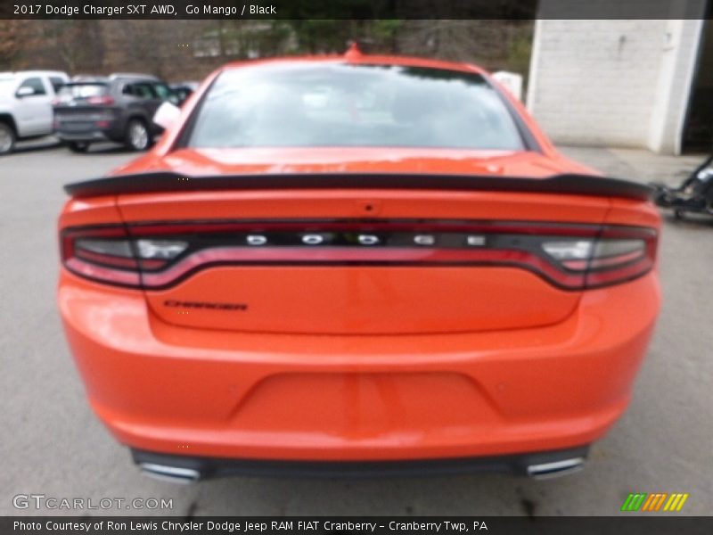 Go Mango / Black 2017 Dodge Charger SXT AWD