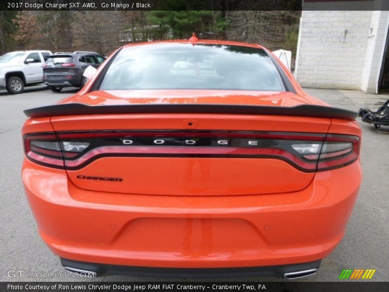 Go Mango / Black 2017 Dodge Charger SXT AWD