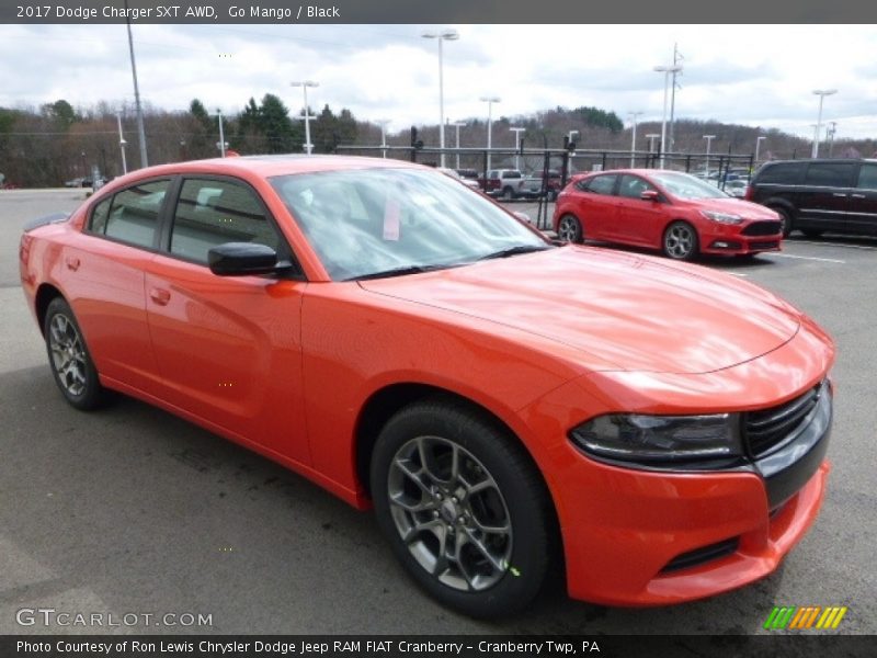 Go Mango / Black 2017 Dodge Charger SXT AWD