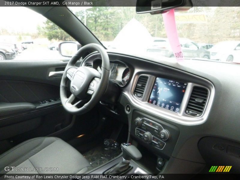 Go Mango / Black 2017 Dodge Charger SXT AWD