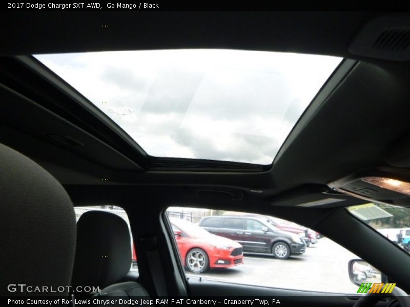 Go Mango / Black 2017 Dodge Charger SXT AWD
