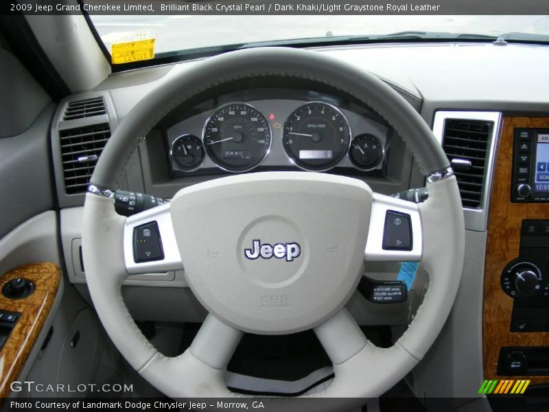 Brilliant Black Crystal Pearl / Dark Khaki/Light Graystone Royal Leather 2009 Jeep Grand Cherokee Limited