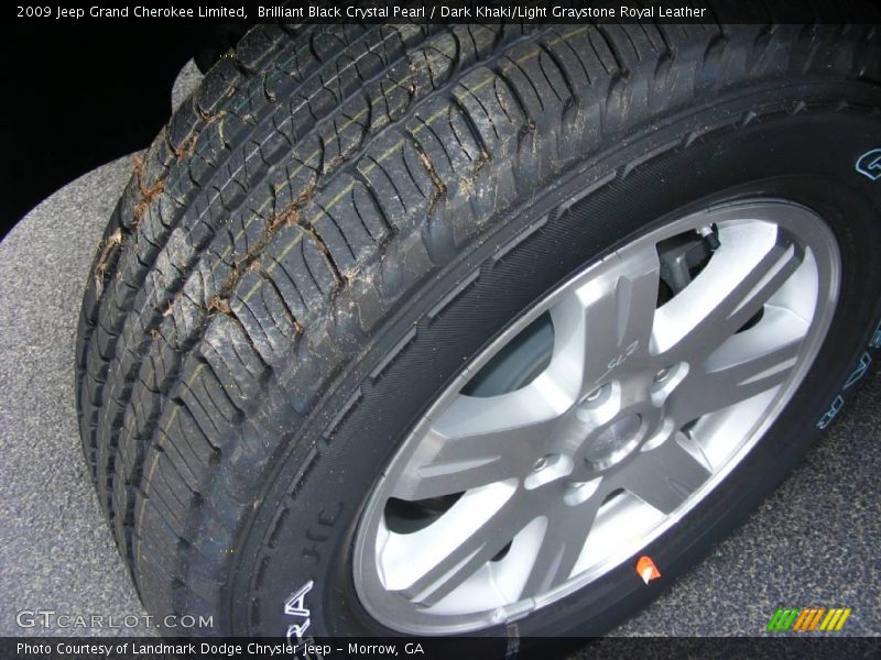 Brilliant Black Crystal Pearl / Dark Khaki/Light Graystone Royal Leather 2009 Jeep Grand Cherokee Limited
