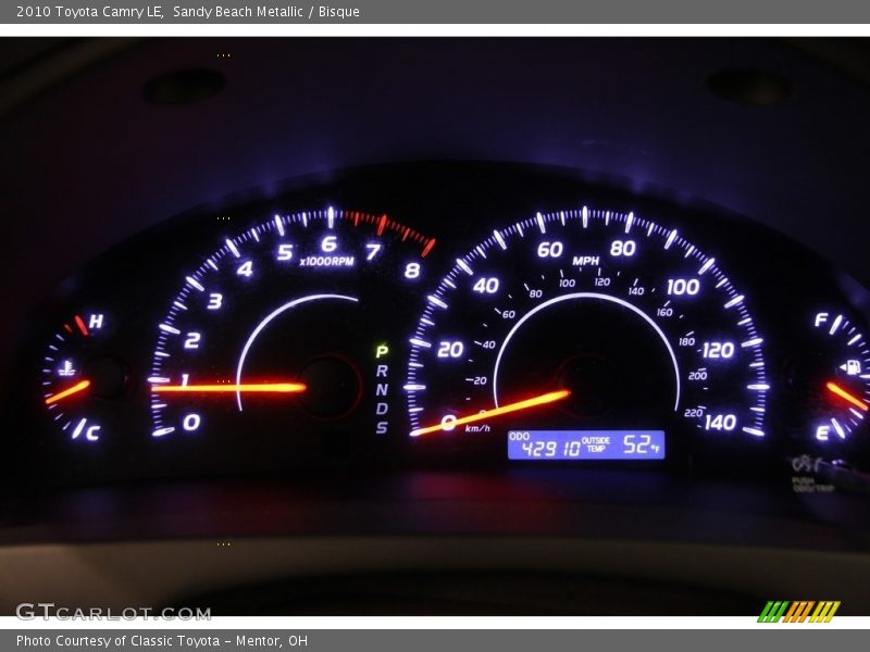 Sandy Beach Metallic / Bisque 2010 Toyota Camry LE