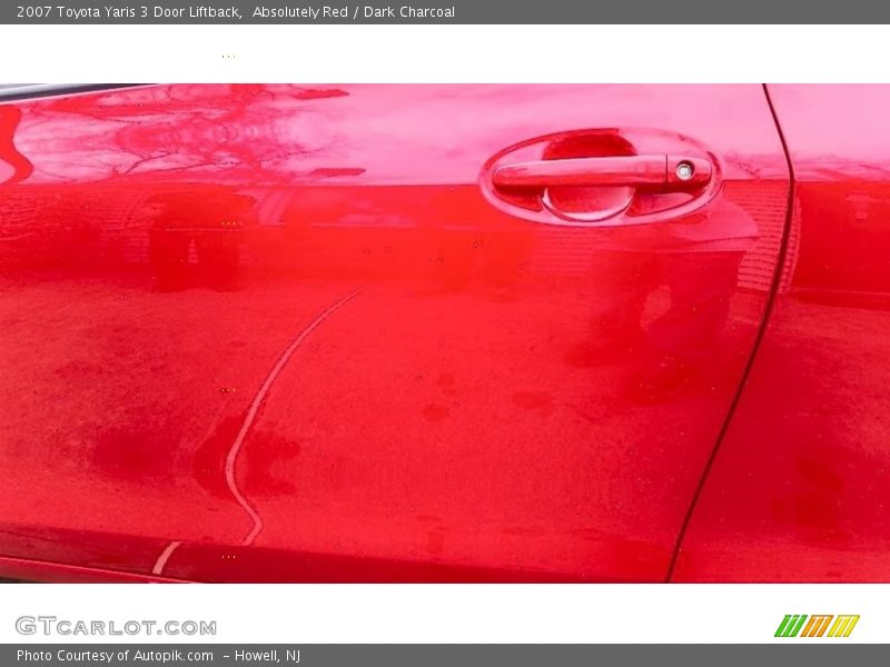 Absolutely Red / Dark Charcoal 2007 Toyota Yaris 3 Door Liftback