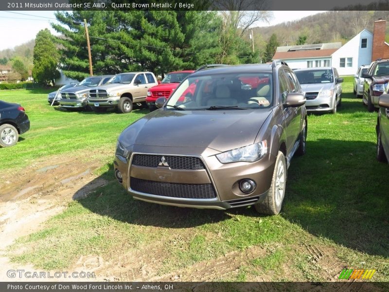 Quartz Brown Metallic / Beige 2011 Mitsubishi Outlander SE AWD
