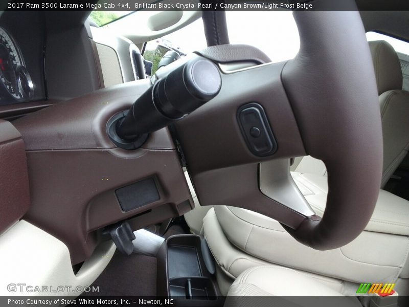 Brilliant Black Crystal Pearl / Canyon Brown/Light Frost Beige 2017 Ram 3500 Laramie Mega Cab 4x4