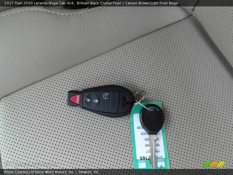 Brilliant Black Crystal Pearl / Canyon Brown/Light Frost Beige 2017 Ram 3500 Laramie Mega Cab 4x4