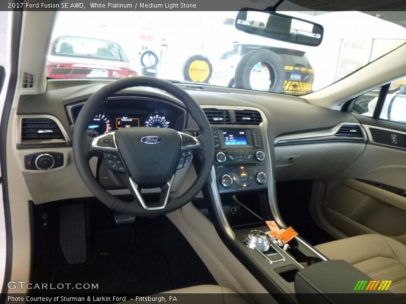 White Platinum / Medium Light Stone 2017 Ford Fusion SE AWD