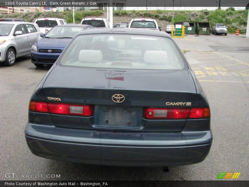 Dark Green Metallic / Oak 1998 Toyota Camry LE