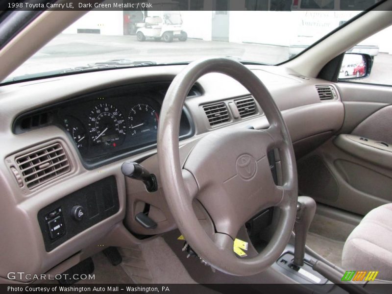 Dark Green Metallic / Oak 1998 Toyota Camry LE