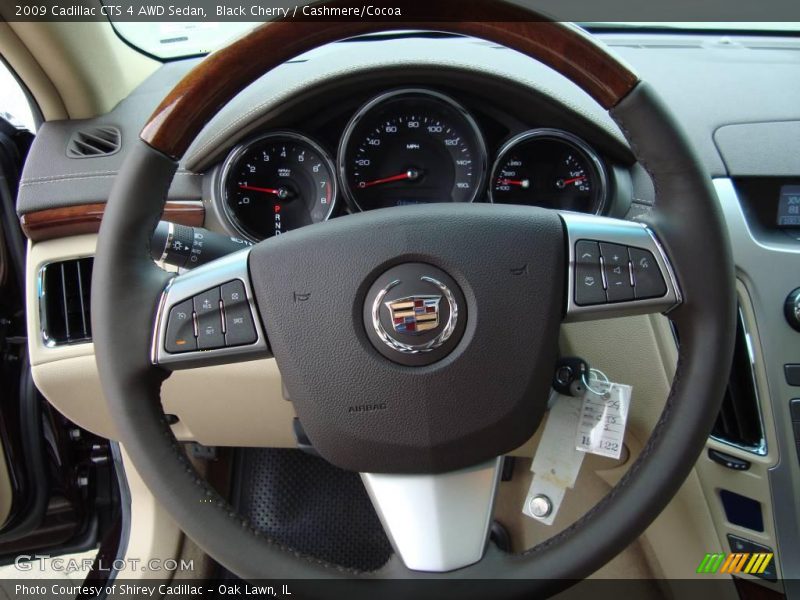 Black Cherry / Cashmere/Cocoa 2009 Cadillac CTS 4 AWD Sedan