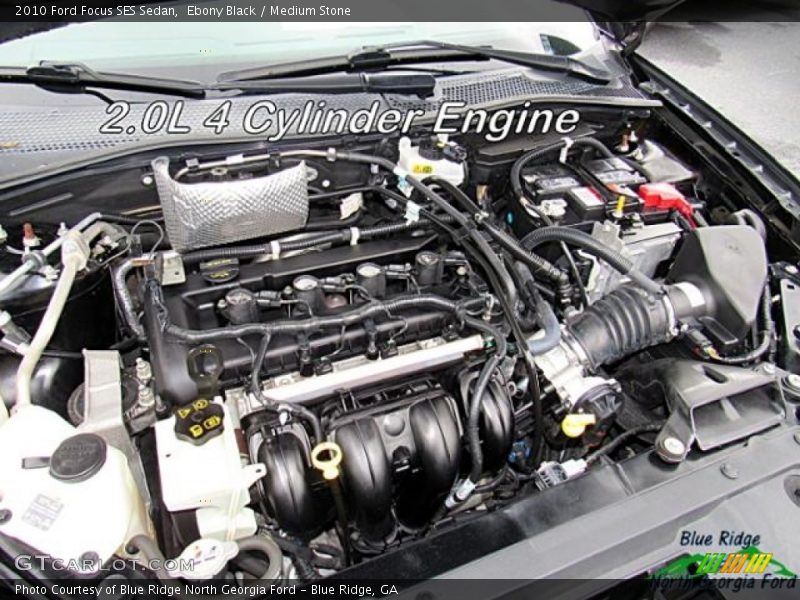 Ebony Black / Medium Stone 2010 Ford Focus SES Sedan
