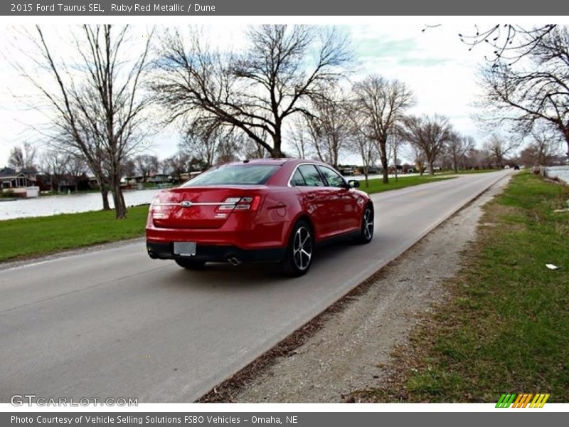 Ruby Red Metallic / Dune 2015 Ford Taurus SEL