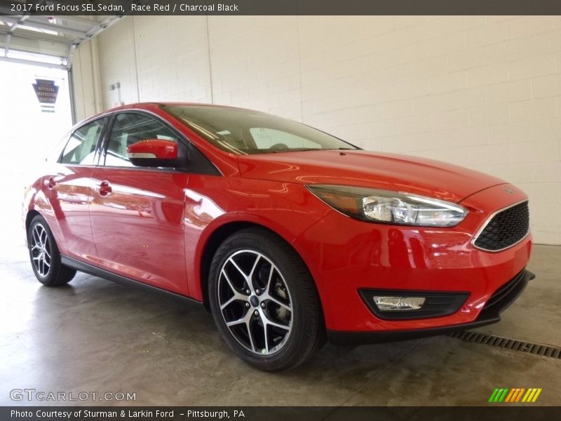 Race Red / Charcoal Black 2017 Ford Focus SEL Sedan