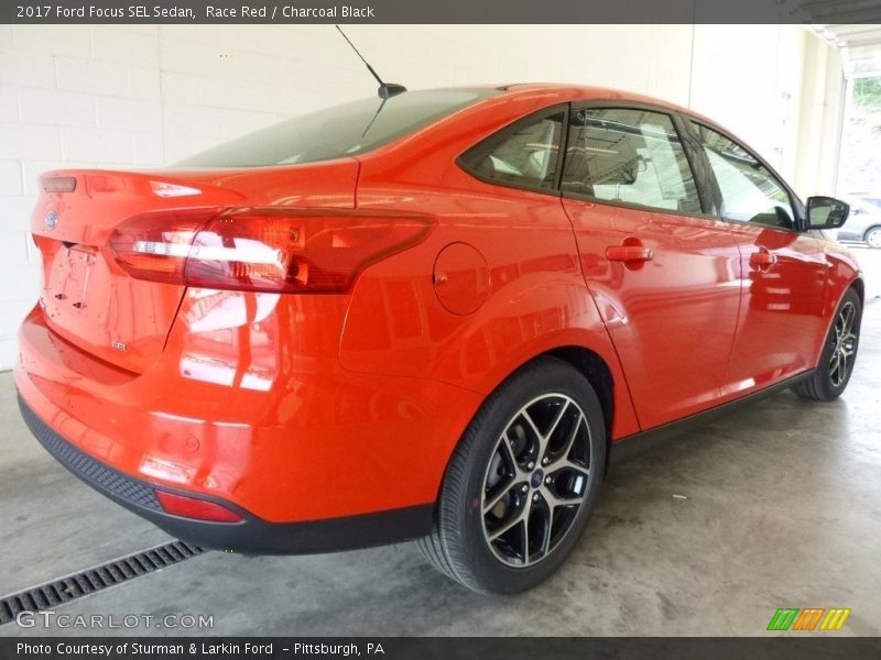 Race Red / Charcoal Black 2017 Ford Focus SEL Sedan