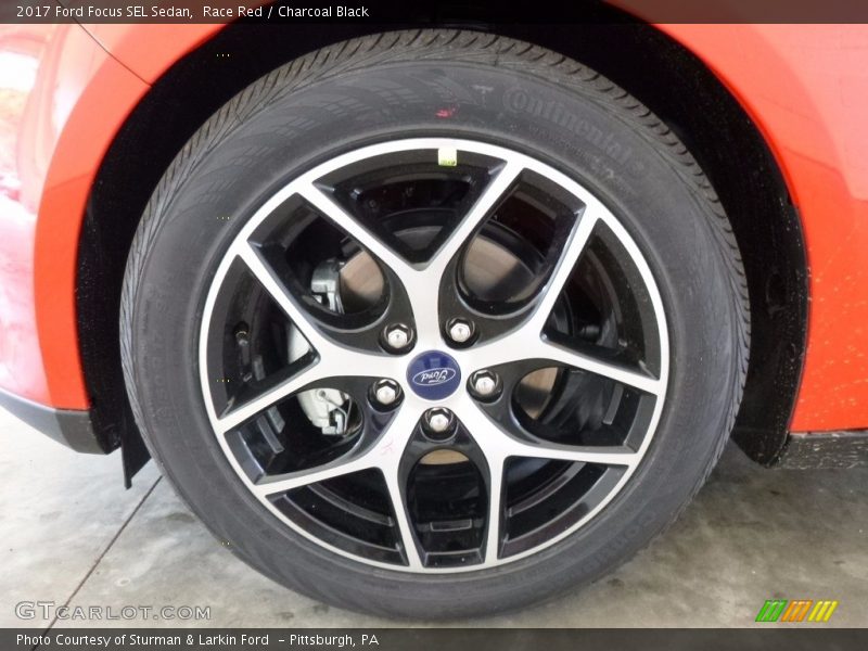 Race Red / Charcoal Black 2017 Ford Focus SEL Sedan