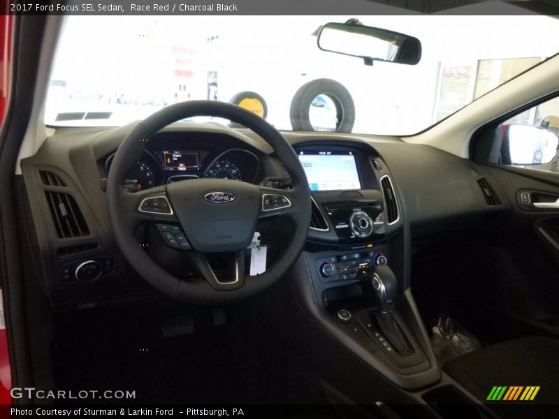 Race Red / Charcoal Black 2017 Ford Focus SEL Sedan