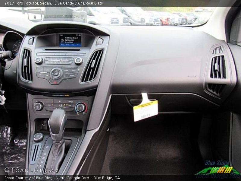 Blue Candy / Charcoal Black 2017 Ford Focus SE Sedan