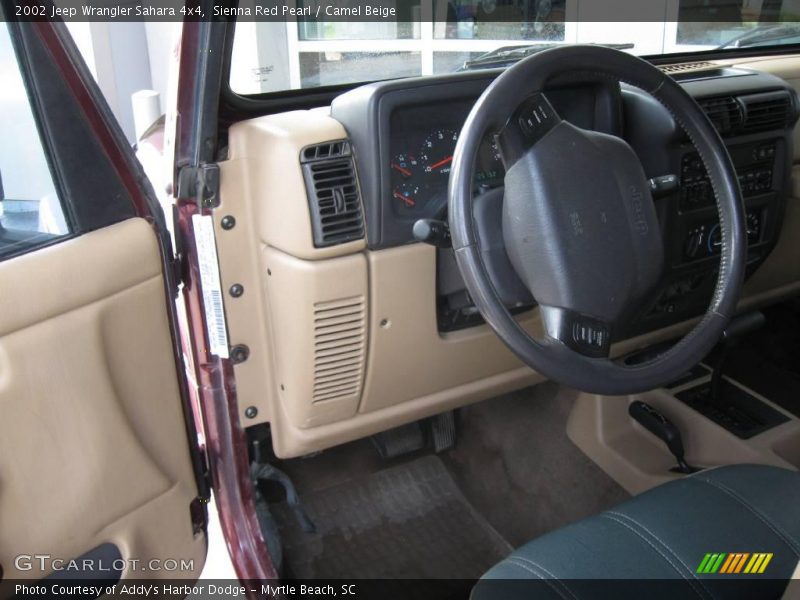 Sienna Red Pearl / Camel Beige 2002 Jeep Wrangler Sahara 4x4