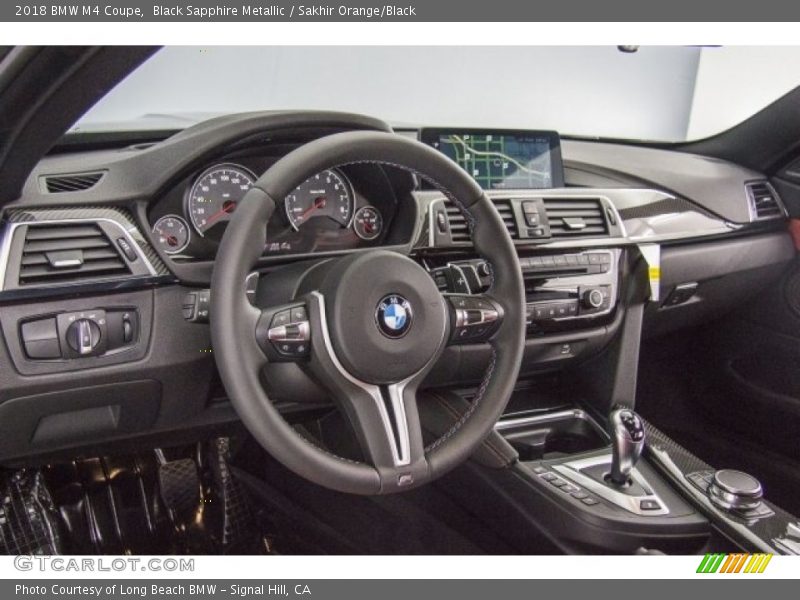 Black Sapphire Metallic / Sakhir Orange/Black 2018 BMW M4 Coupe