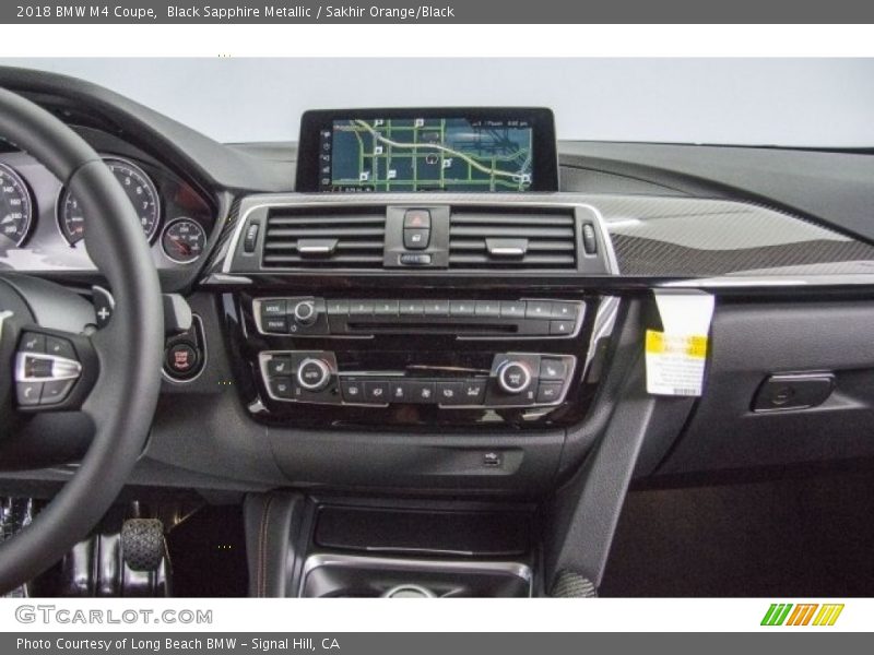 Black Sapphire Metallic / Sakhir Orange/Black 2018 BMW M4 Coupe