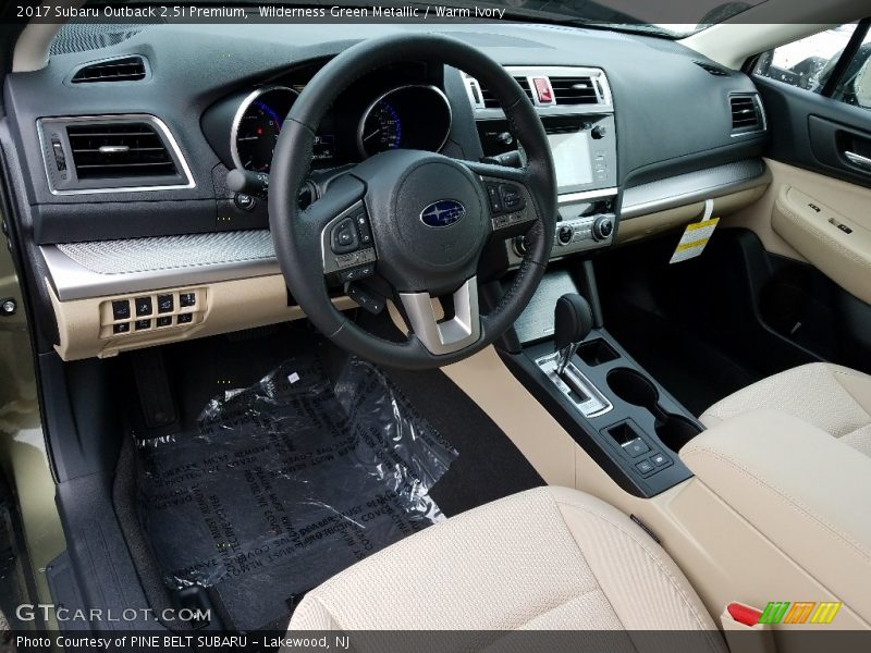 Wilderness Green Metallic / Warm Ivory 2017 Subaru Outback 2.5i Premium