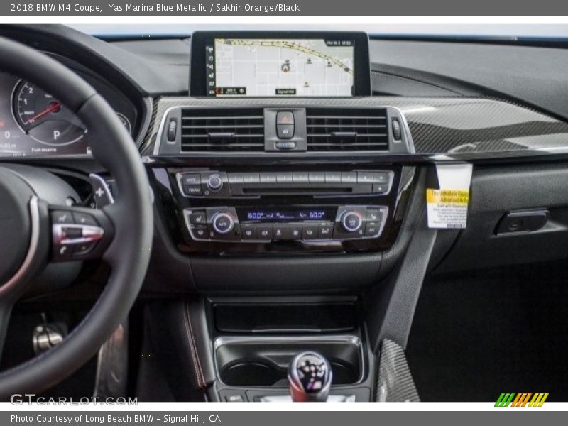 Yas Marina Blue Metallic / Sakhir Orange/Black 2018 BMW M4 Coupe