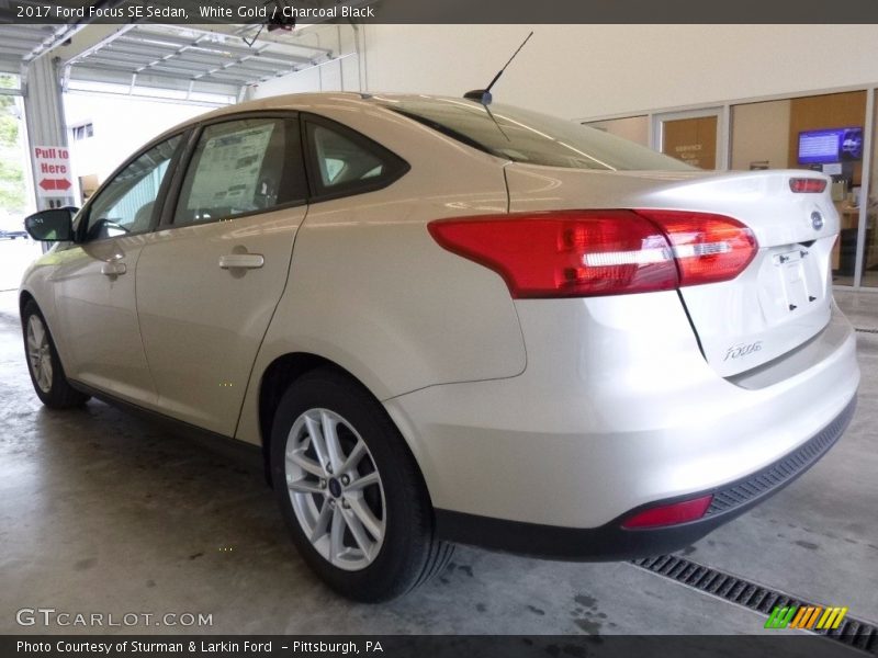White Gold / Charcoal Black 2017 Ford Focus SE Sedan
