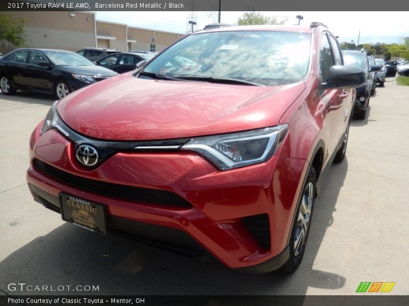 Barcelona Red Metallic / Black 2017 Toyota RAV4 LE AWD