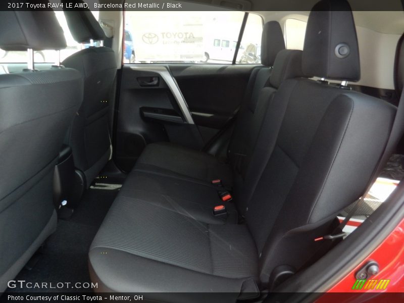 Barcelona Red Metallic / Black 2017 Toyota RAV4 LE AWD