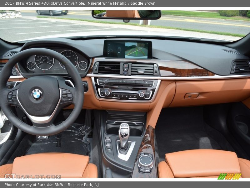 Mineral White Metallic / Saddle Brown 2017 BMW 4 Series 430i xDrive Convertible