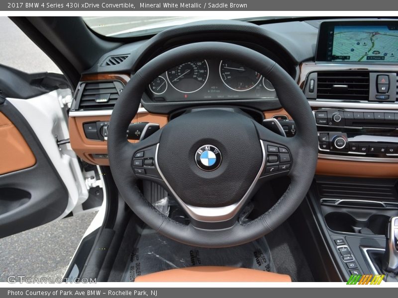 Mineral White Metallic / Saddle Brown 2017 BMW 4 Series 430i xDrive Convertible