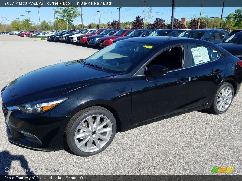 Front 3/4 View of 2017 MAZDA3 Touring 4 Door