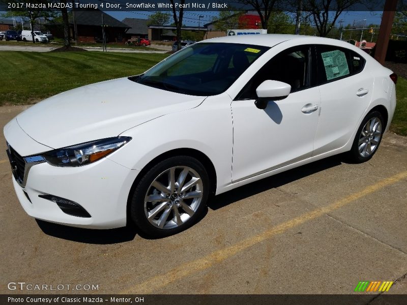 Front 3/4 View of 2017 MAZDA3 Touring 4 Door