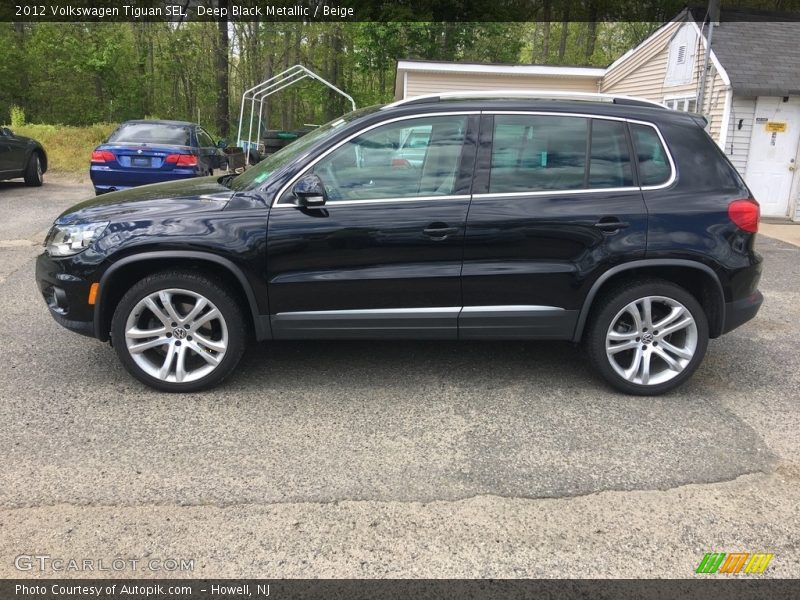 Deep Black Metallic / Beige 2012 Volkswagen Tiguan SEL