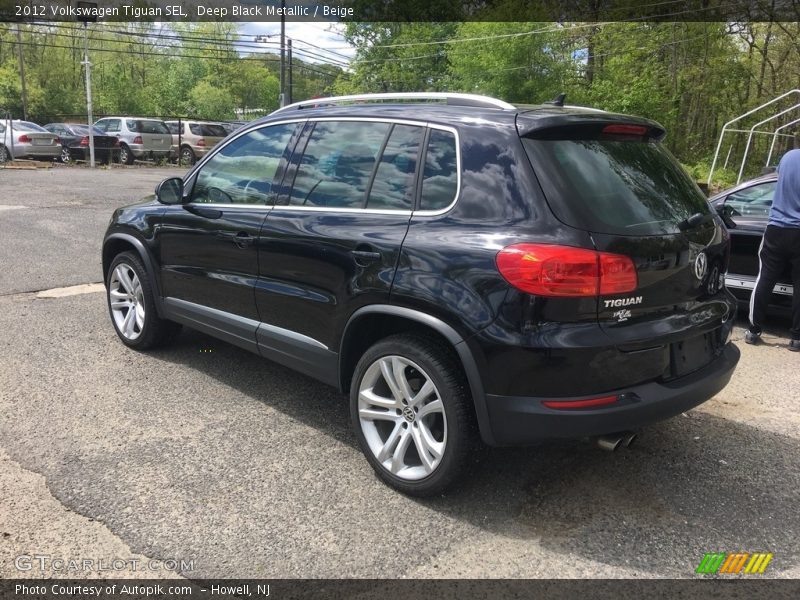 Deep Black Metallic / Beige 2012 Volkswagen Tiguan SEL