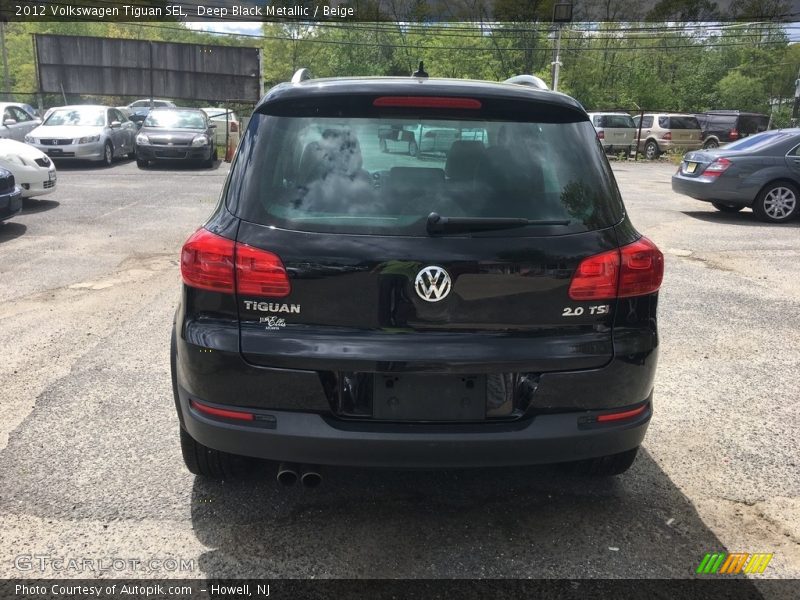 Deep Black Metallic / Beige 2012 Volkswagen Tiguan SEL