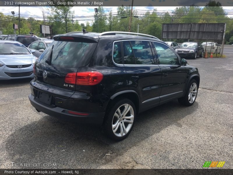 Deep Black Metallic / Beige 2012 Volkswagen Tiguan SEL