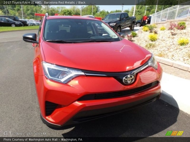 Barcelona Red Metallic / Black 2017 Toyota RAV4 LE AWD