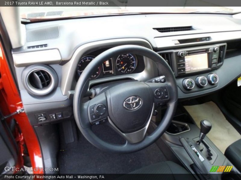 Barcelona Red Metallic / Black 2017 Toyota RAV4 LE AWD