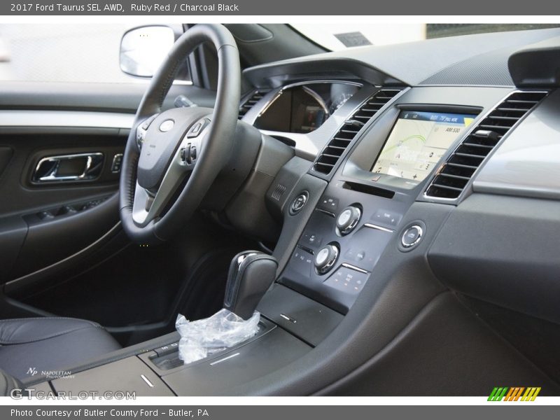 Ruby Red / Charcoal Black 2017 Ford Taurus SEL AWD