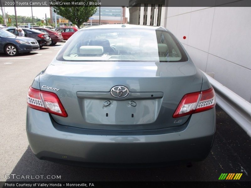Aloe Green Metallic / Bisque 2010 Toyota Camry LE
