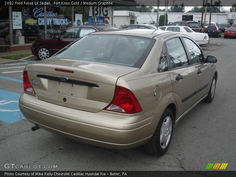 Fort Knox Gold / Medium Graphite 2002 Ford Focus LX Sedan