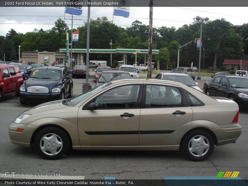 Fort Knox Gold / Medium Graphite 2002 Ford Focus LX Sedan