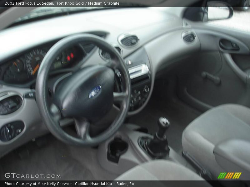 Fort Knox Gold / Medium Graphite 2002 Ford Focus LX Sedan
